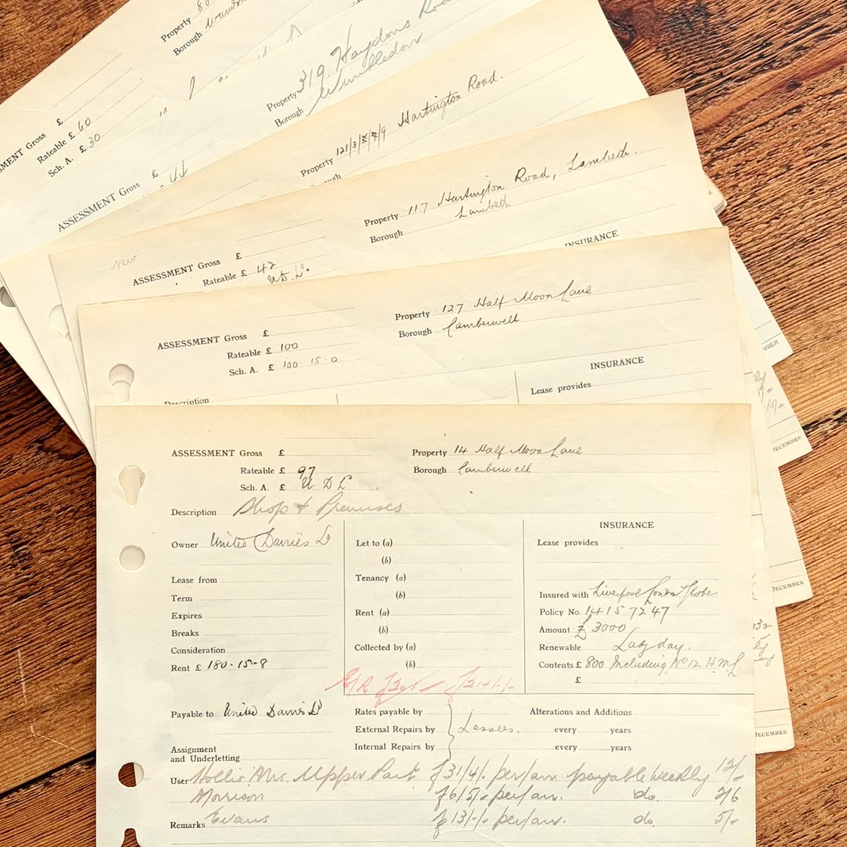 A photographed ledger with dates and amounts